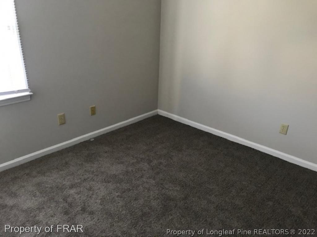 6140 Rhemish Drive Fayetteville, NC 28304 - Photo 8 of 12 a view of an empty room