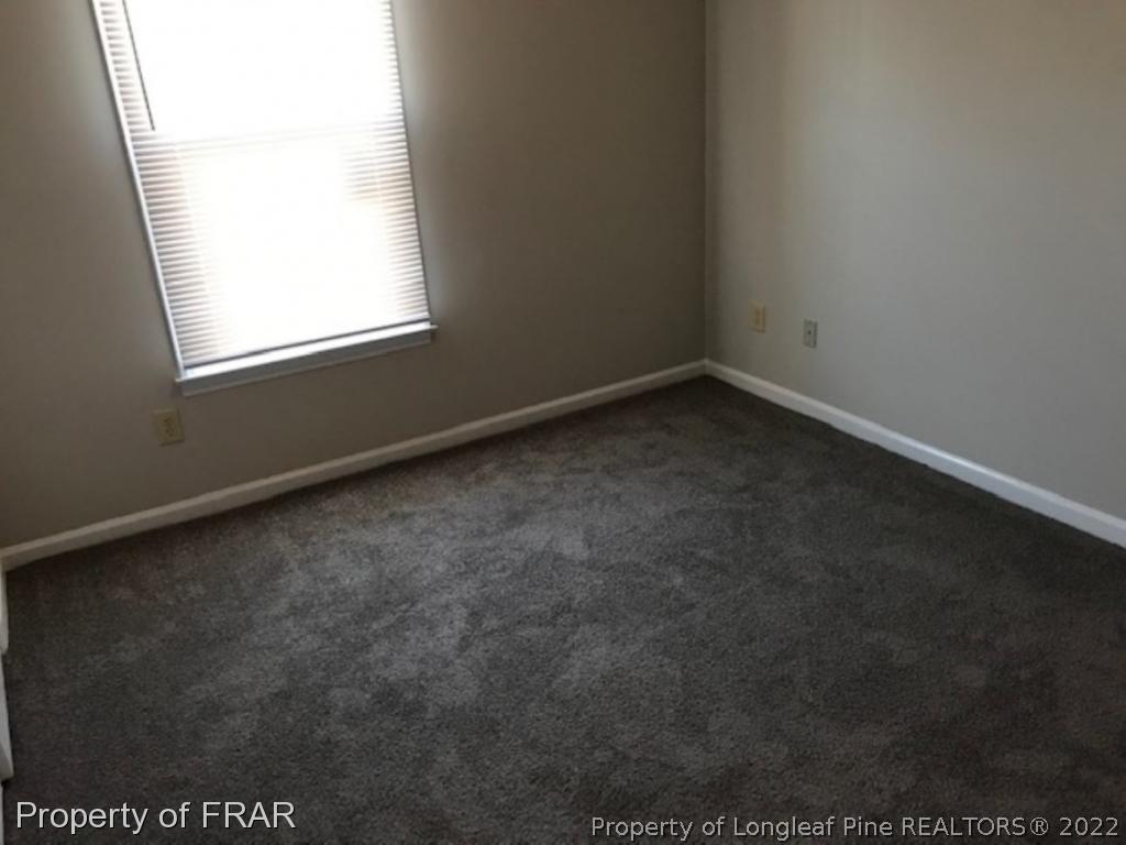 6140 Rhemish Drive Fayetteville, NC 28304 - Photo 10 of 12 an empty room with a window