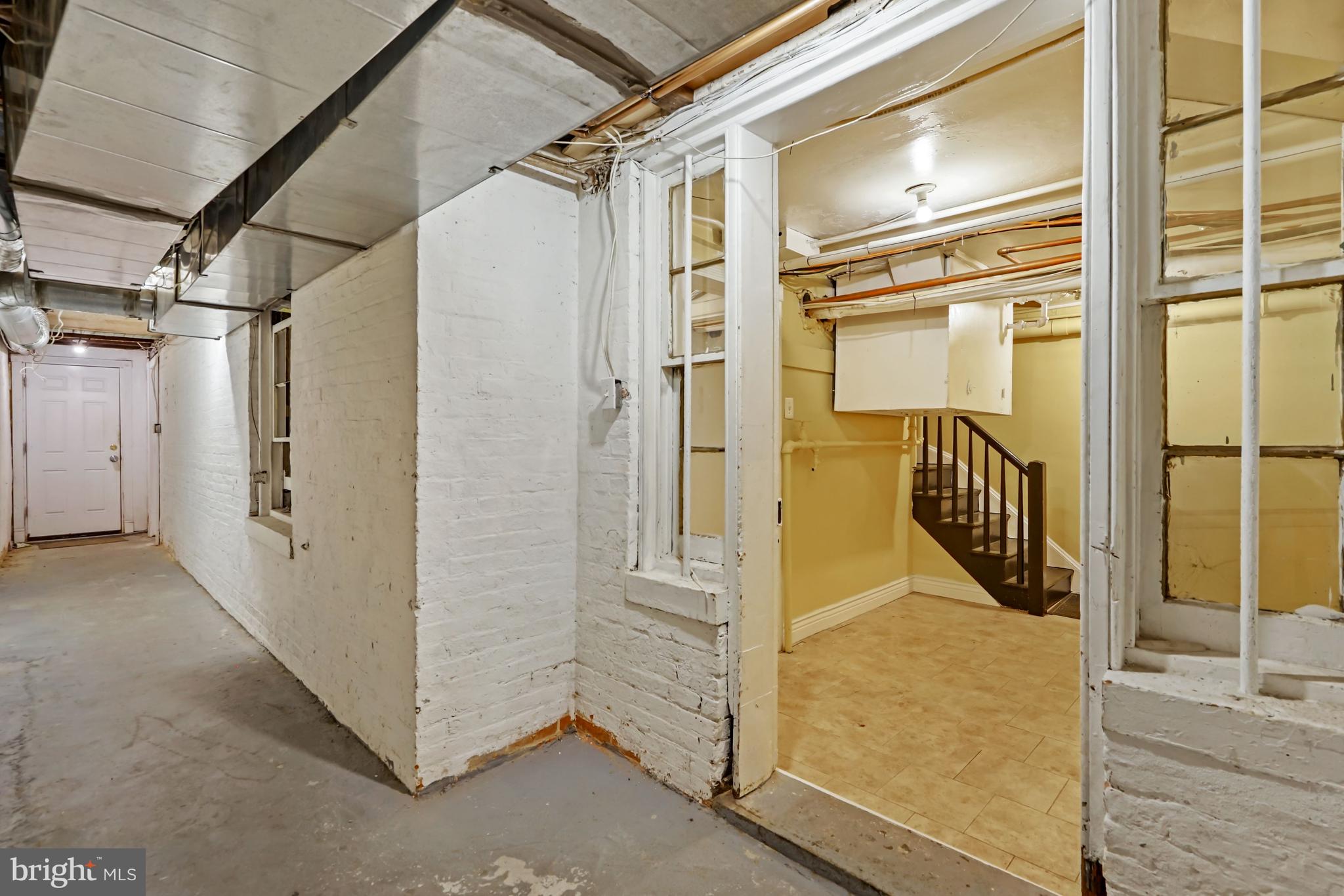 937 St Paul Street Baltimore, MD 21202 - Photo 47 of 53 Interior Passageway from Rear Lower Level Door