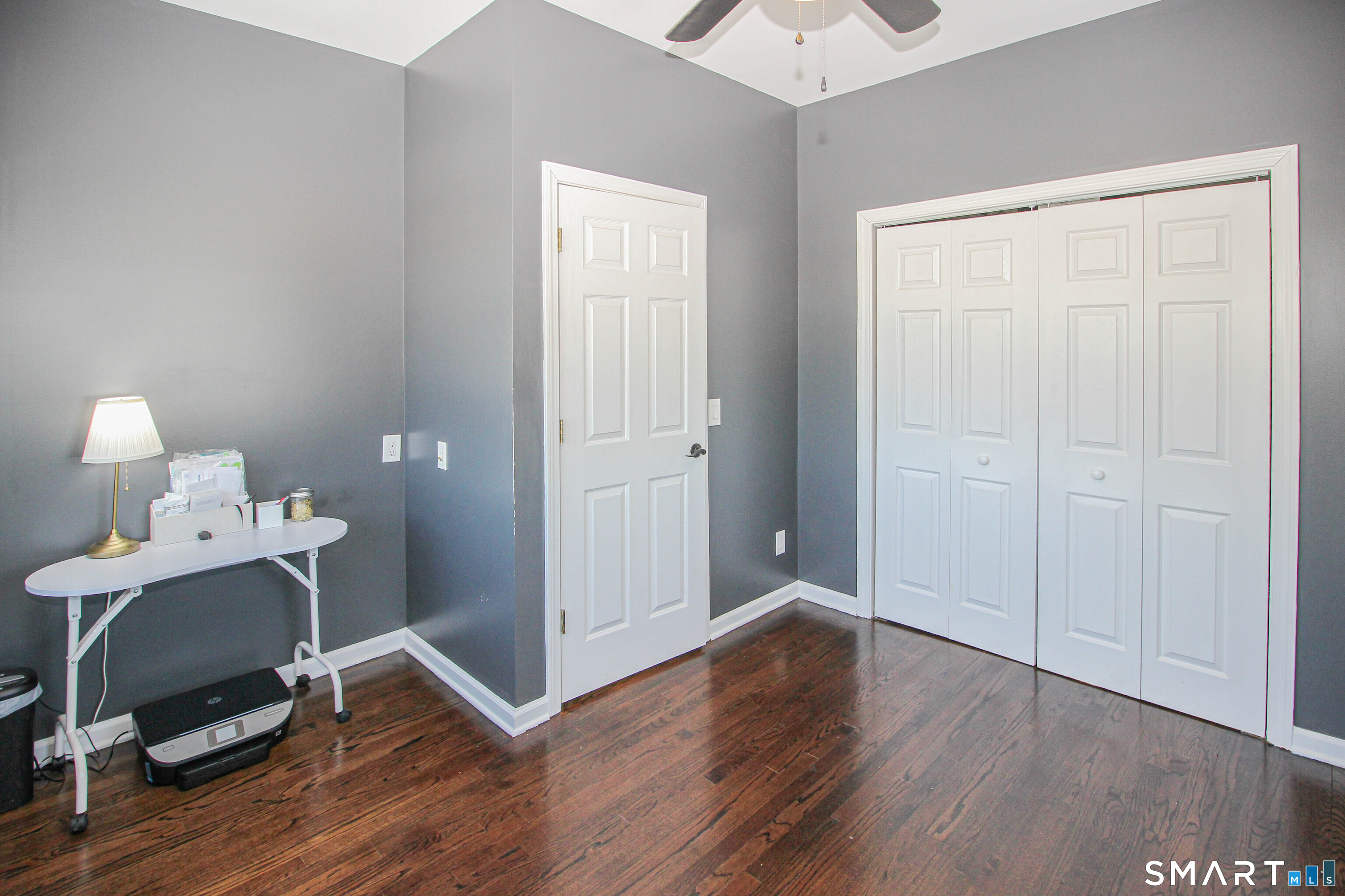 235 Lucille Street Newington, CT 06111 - Photo 14 of 35 a view of a workspace with wooden floor and a workspace