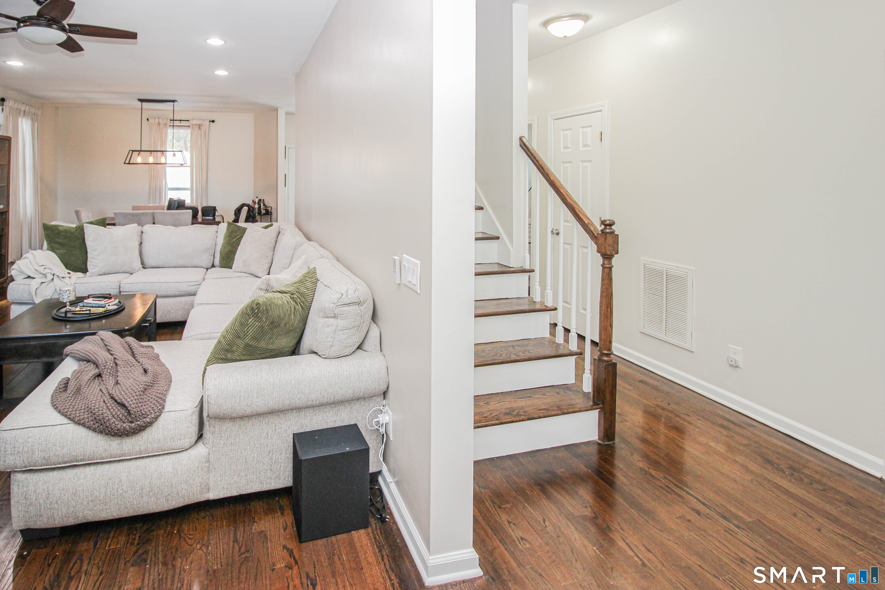 235 Lucille Street Newington, CT 06111 - Photo 16 of 35 a living room with furniture and wooden floor