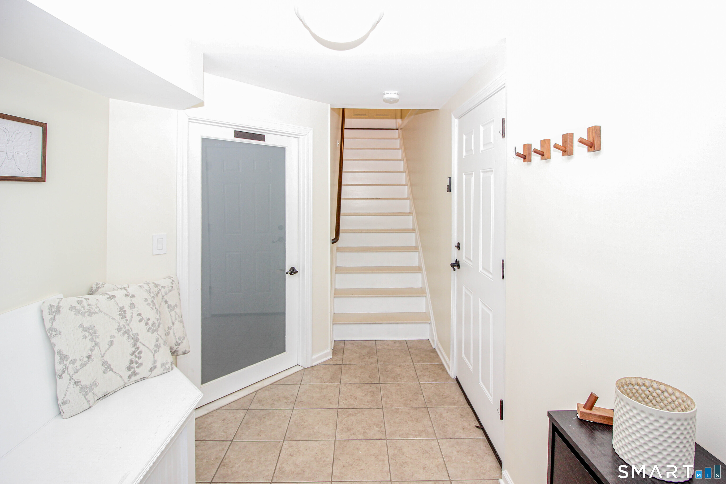 235 Lucille Street Newington, CT 06111 - Photo 27 of 35 a view of livingroom with stairs and furniture