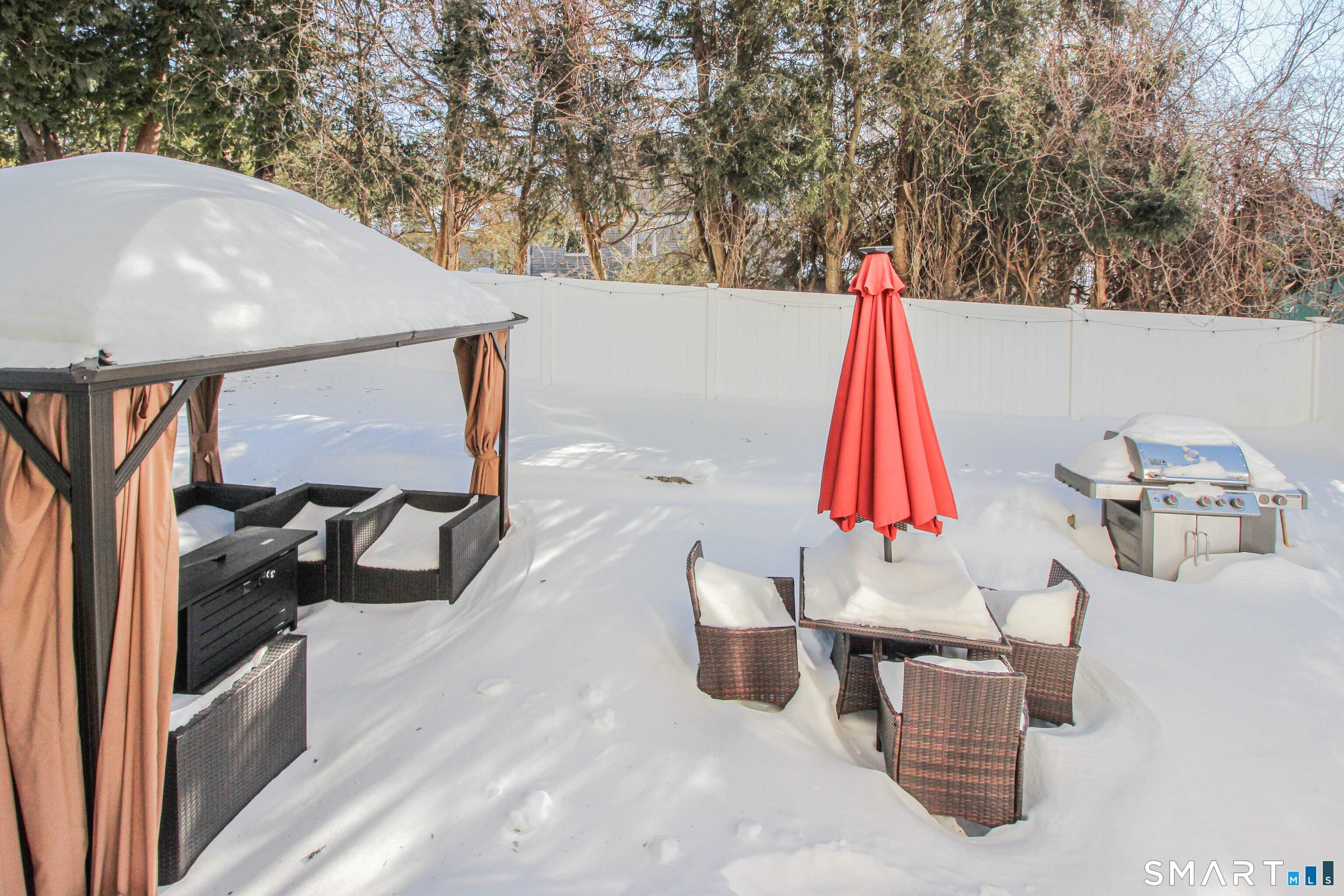 235 Lucille Street Newington, CT 06111 - Photo 33 of 35 a view of roof deck with chair and refrigerator