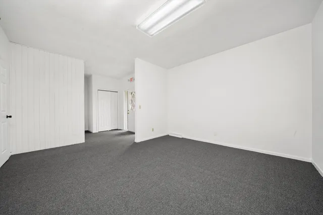 a view of a room with rack on the wall