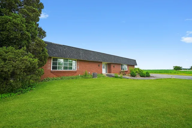 a garden view with a sitting space
