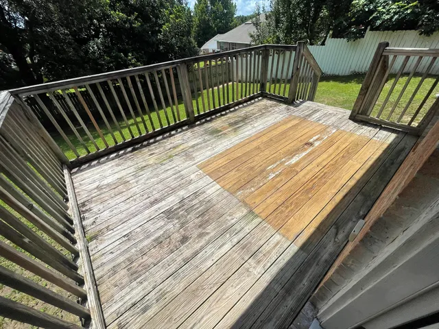 a balcony with wooden floor