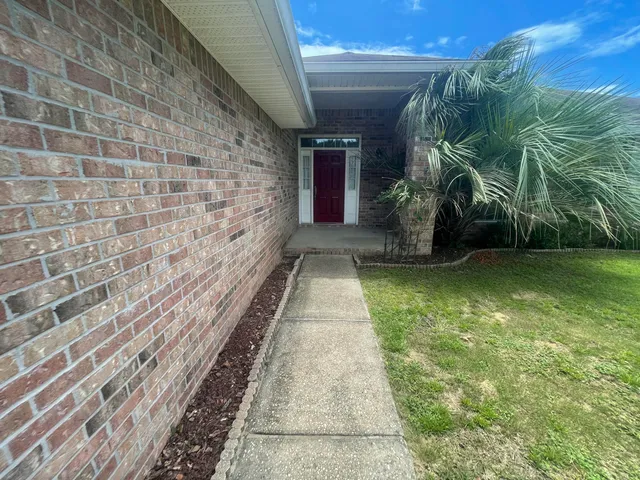 a view of a pathway with a house