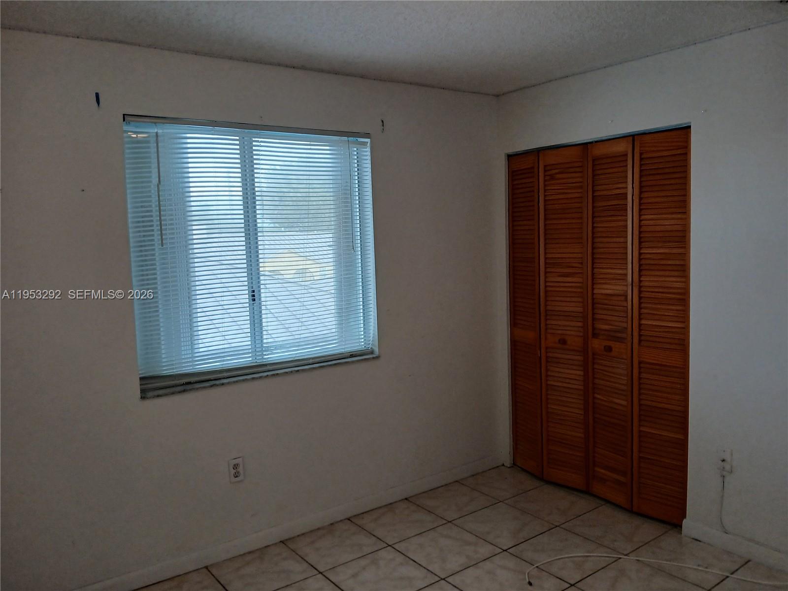 3254 West 70th Street, Unit 202 Hialeah, FL 33018 - Photo 16 of 20 2nd bedroom