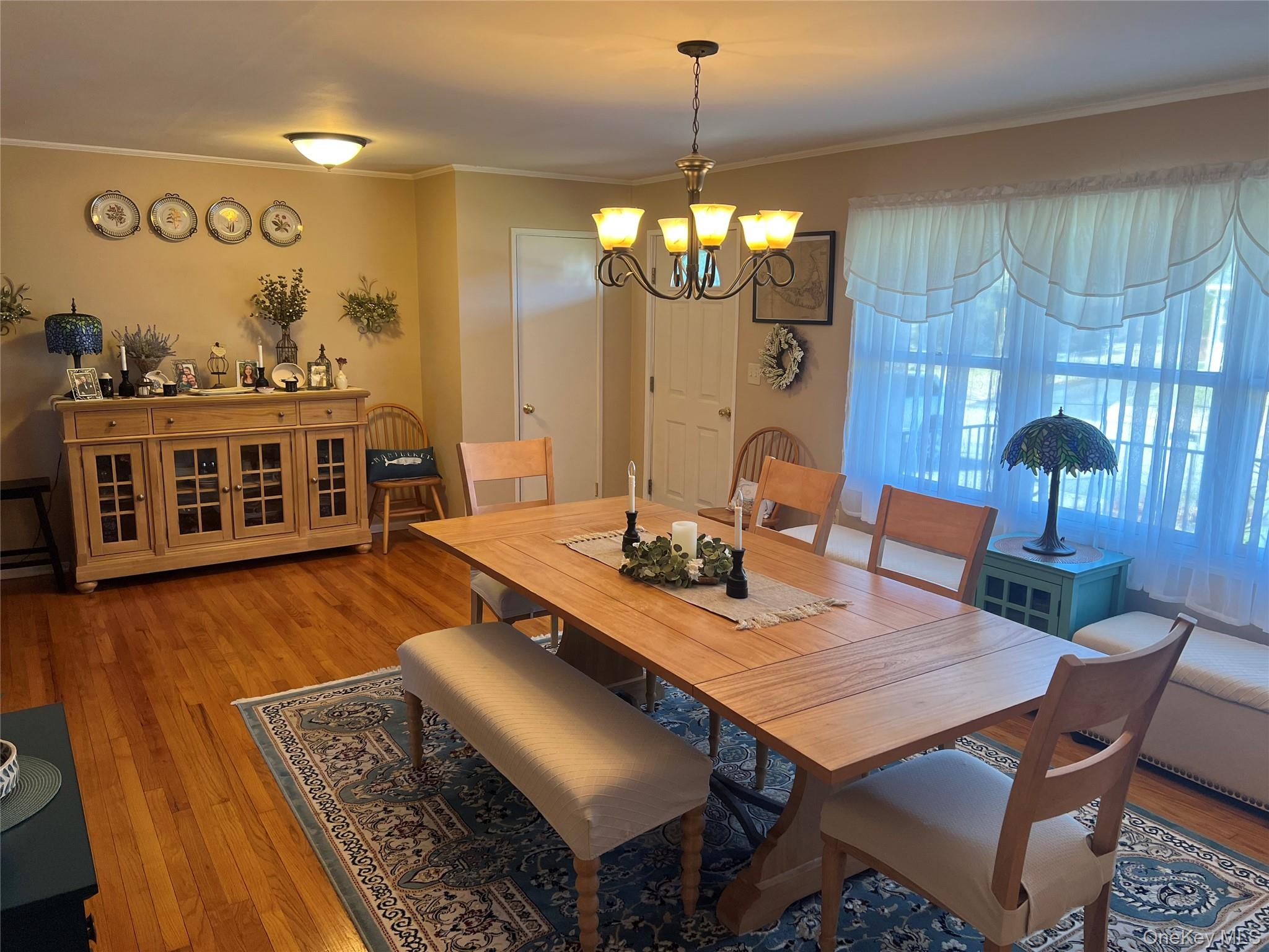 7 Pulaski Road, Unit 7 Fishkill, NY 12524 - Photo 4 of 38 Dining room with hardwood flooring with views of front yard