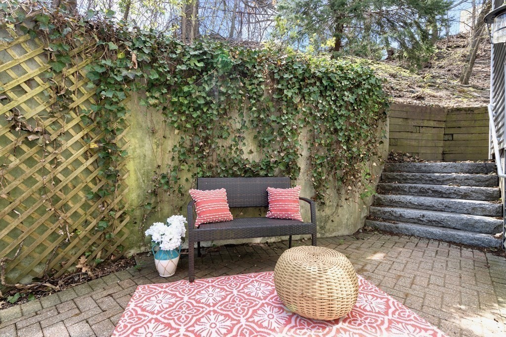 43 North Mead Street, Unit 43 Boston, MA 02129 - Photo 12 of 17 a outdoor living space with furniture and wooden floor