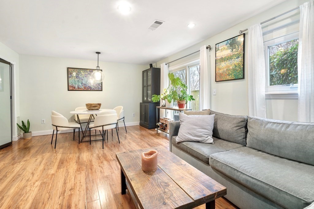 43 North Mead Street, Unit 43 Boston, MA 02129 - Photo 2 of 17 a living room with furniture and a window