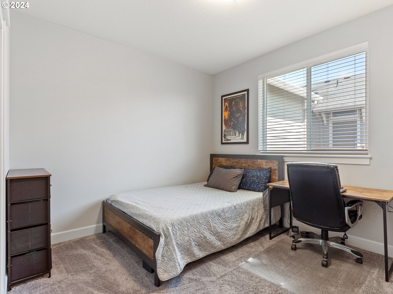 4723 South 17th Way Ridgefield, WA 98642 - Photo 36 of 48 a bedroom with a bed chair and a window