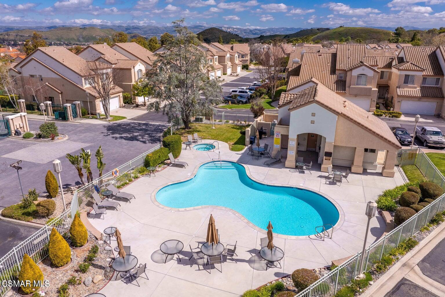 652 Cardinal Ridge Lane, Unit D Simi Valley, CA 93065 - Photo 44 of 44 an aerial view of a house with swimming pool