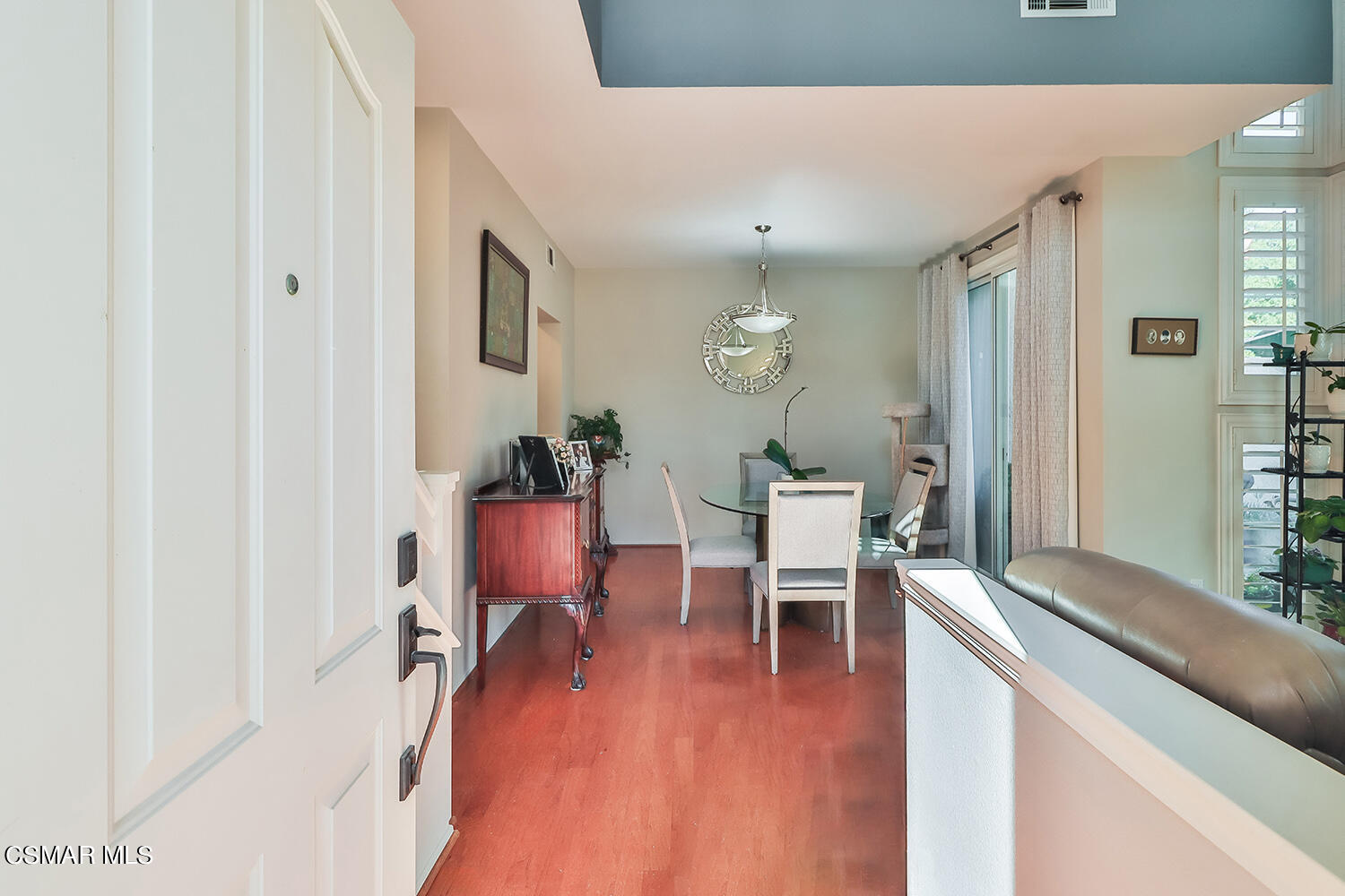 652 Cardinal Ridge Lane, Unit D Simi Valley, CA 93065 - Photo 8 of 44 a view of a dining room with furniture and wooden floor