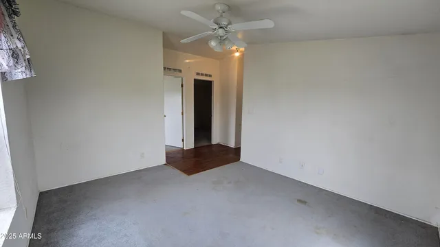 a view of livingroom with furniture and window