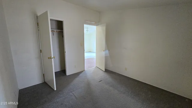 a view of a house with a yard and plants