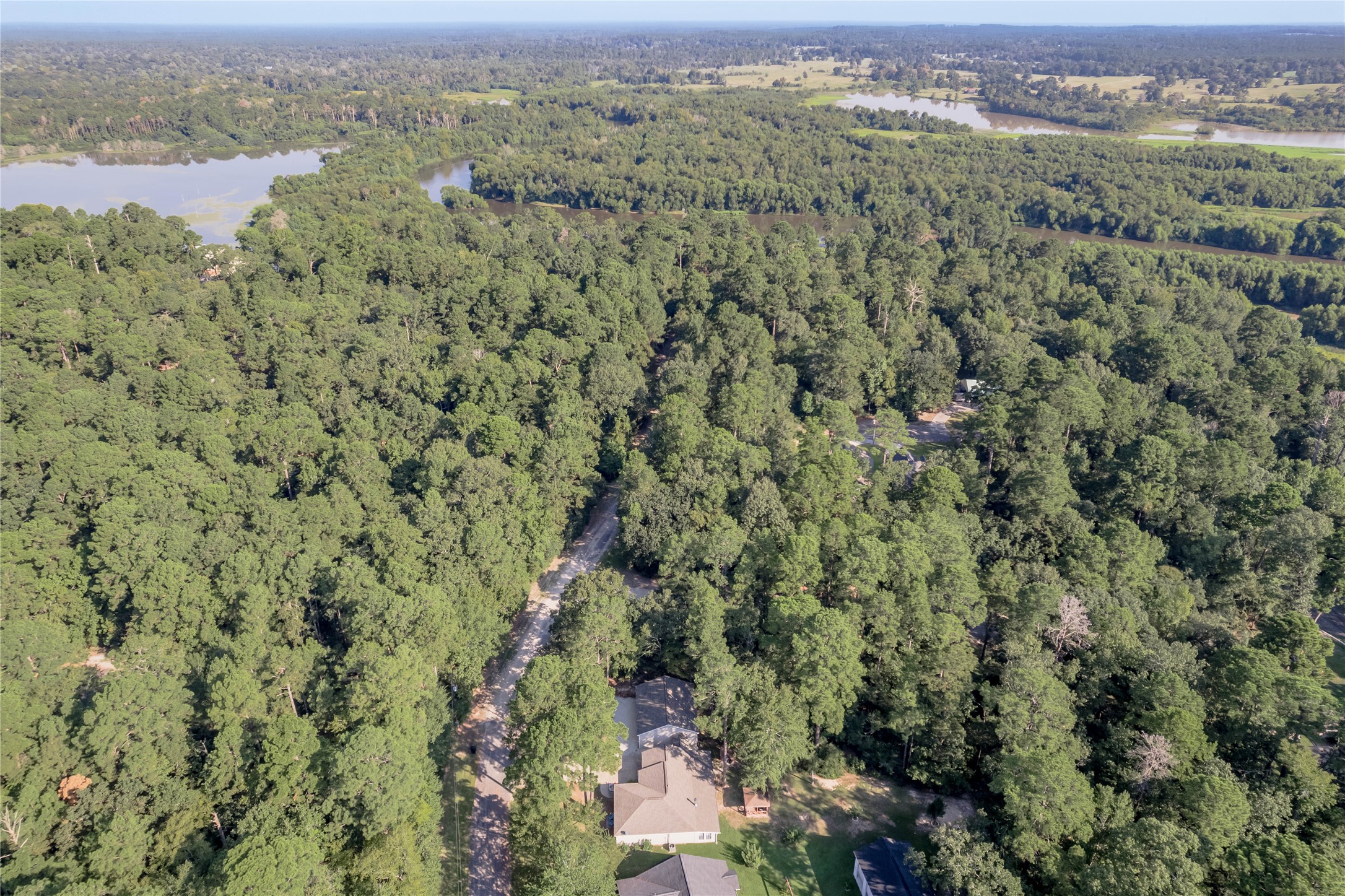 37 Spreading Oak Trinity, TX 75862 - Photo 7 of 21 an aerial view of a houses with a yard