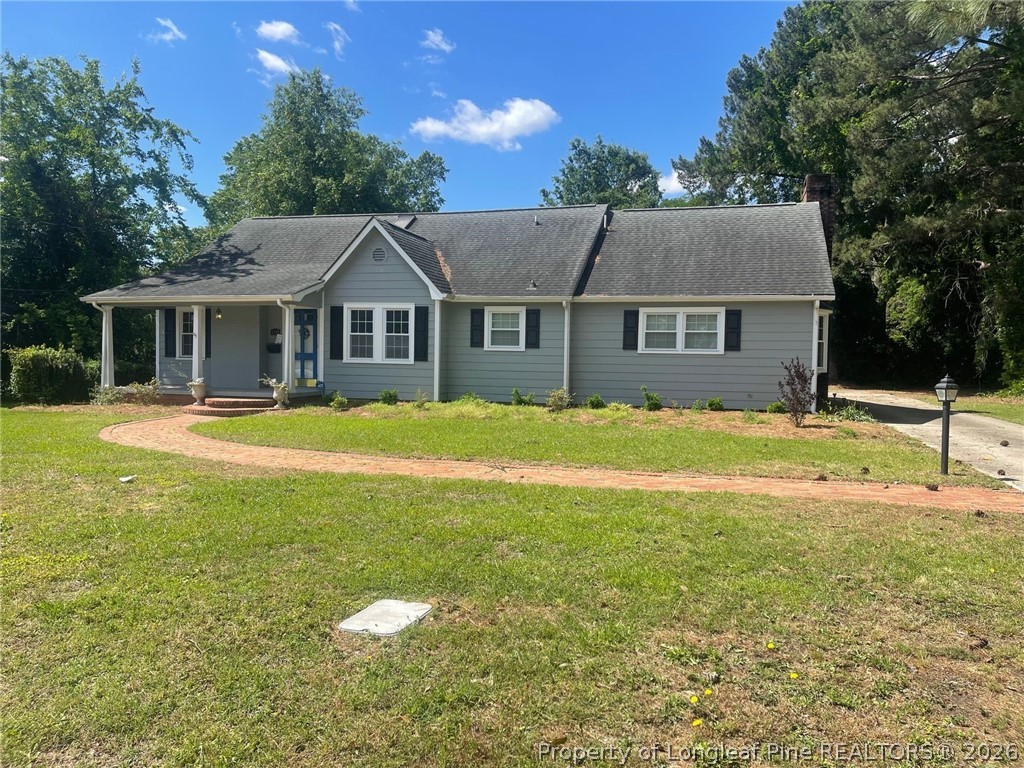 2515 Fort Bragg Road Fayetteville, NC 28303 - Photo 1 of 23 a house view with a garden space