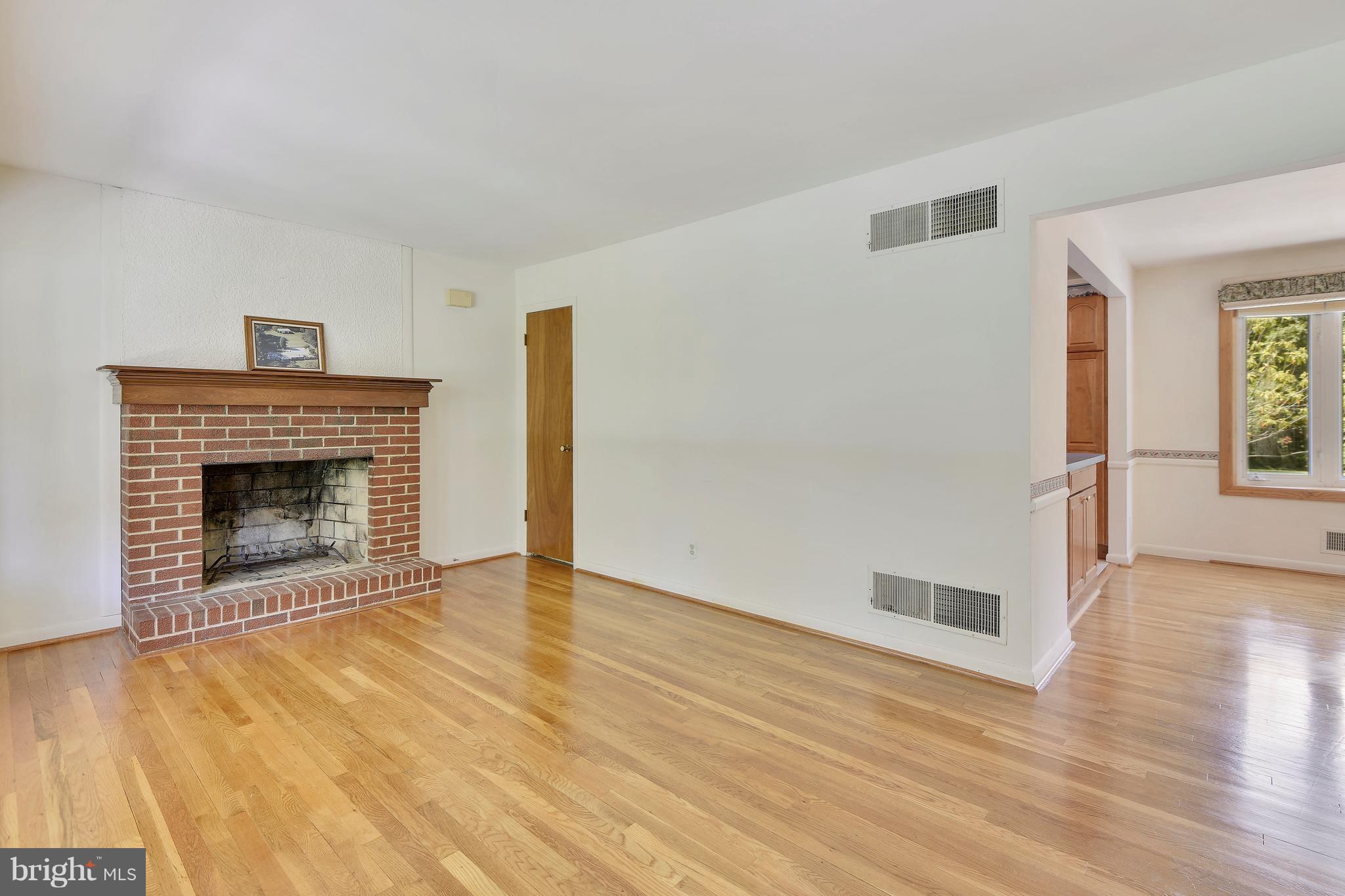 1416 Gilbert Road Arnold, MD 21012 - Photo 4 of 30 Living Room with Wood-burning Fireplace