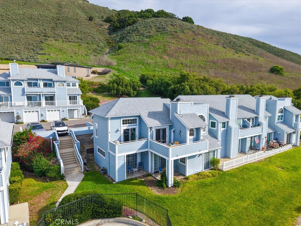 428 Westpoint Drive Pismo Beach, CA 93449 - Photo 47 of 58 a view of residential houses with yard and mountain view in back