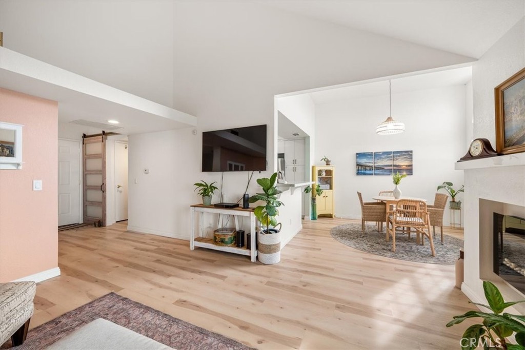 428 Westpoint Drive Pismo Beach, CA 93449 - Photo 7 of 58 a living room with furniture a fireplace and a flat screen tv