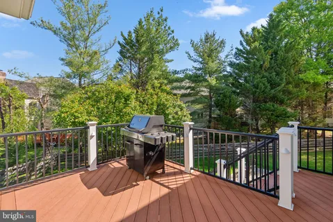 a view of a house with backyard porch and sitting area