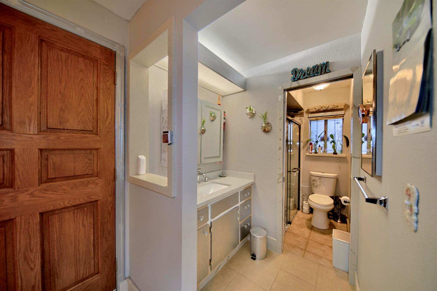 2013 Robertson Road Modesto, CA 95351 - Photo 9 of 24 a bathroom with a tub sink and mirror