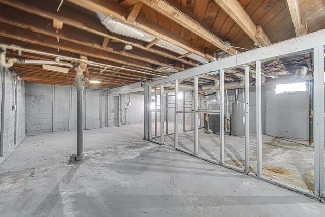 a front view of house with yard and trees