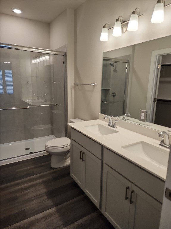 2349 Moon Tower Trail Leander, TX 78641 - Photo 20 of 34 a bathroom with a double vanity sink toilet and shower