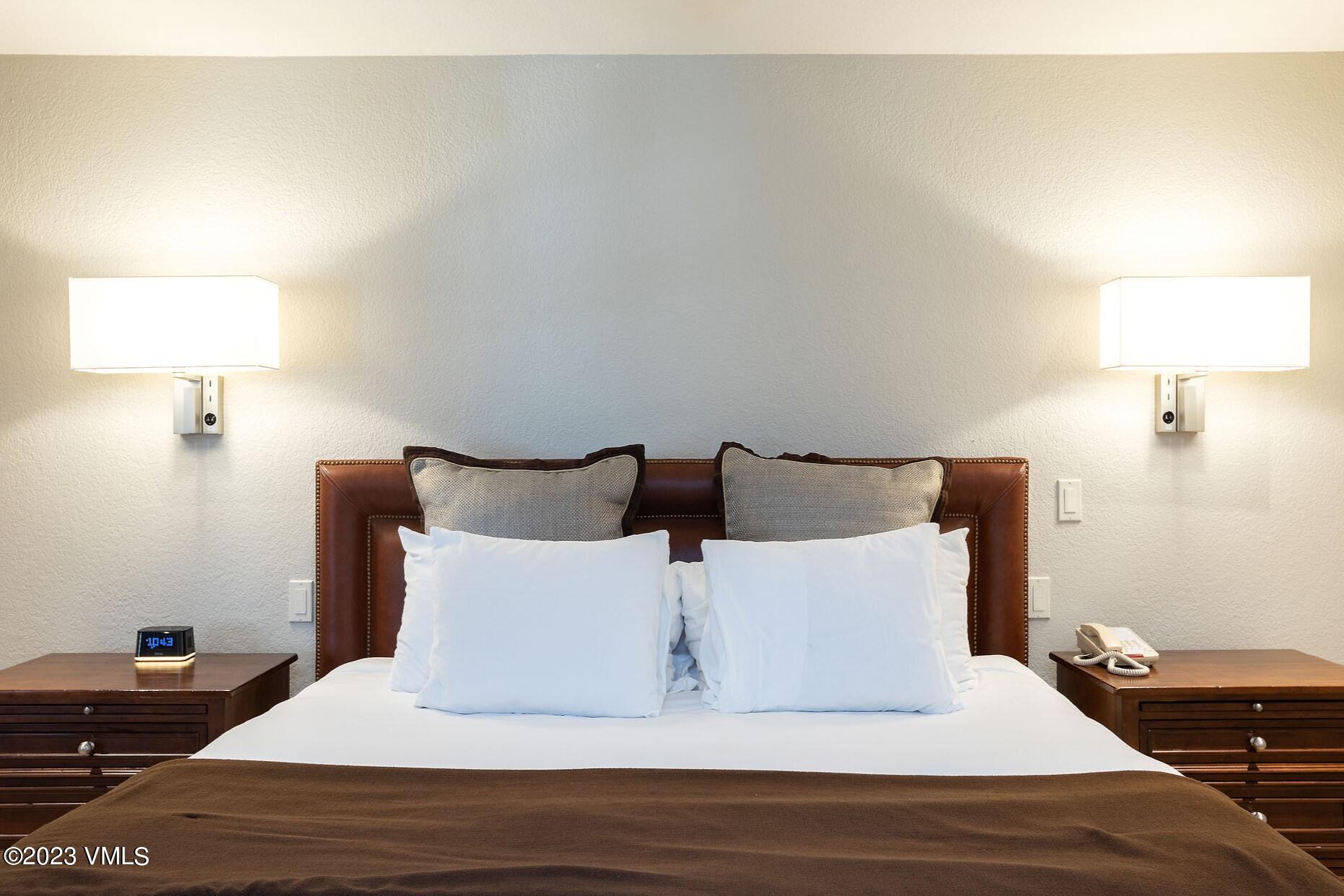 210 Offerson Road, Unit 115 WEEK 33 Beaver Creek, CO 81620 - Photo 13 of 23 a large white bed in a white room