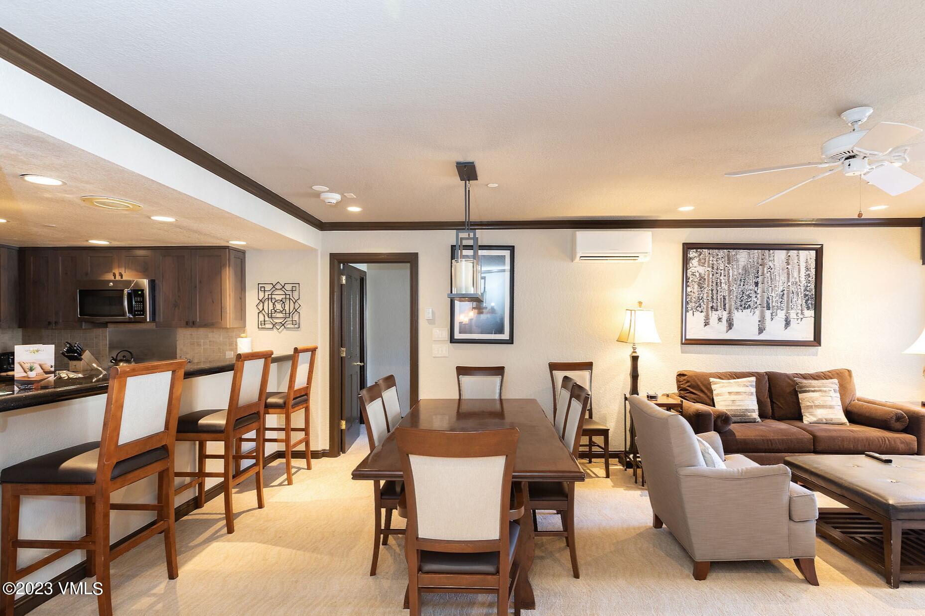 210 Offerson Road, Unit 115 WEEK 33 Beaver Creek, CO 81620 - Photo 4 of 23 a dining room with furniture and window