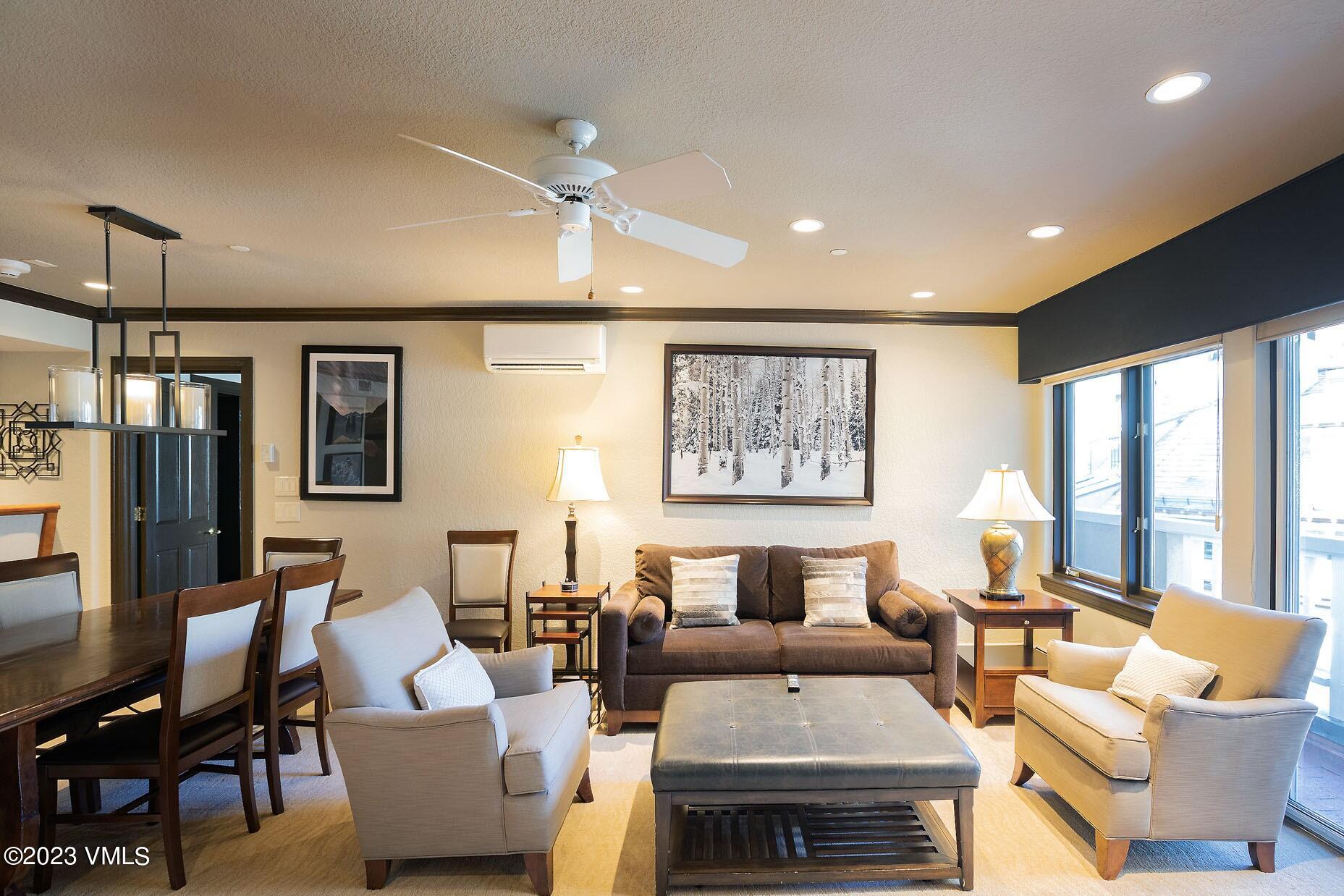 210 Offerson Road, Unit 115 WEEK 33 Beaver Creek, CO 81620 - Photo 5 of 23 a living room with furniture and large window