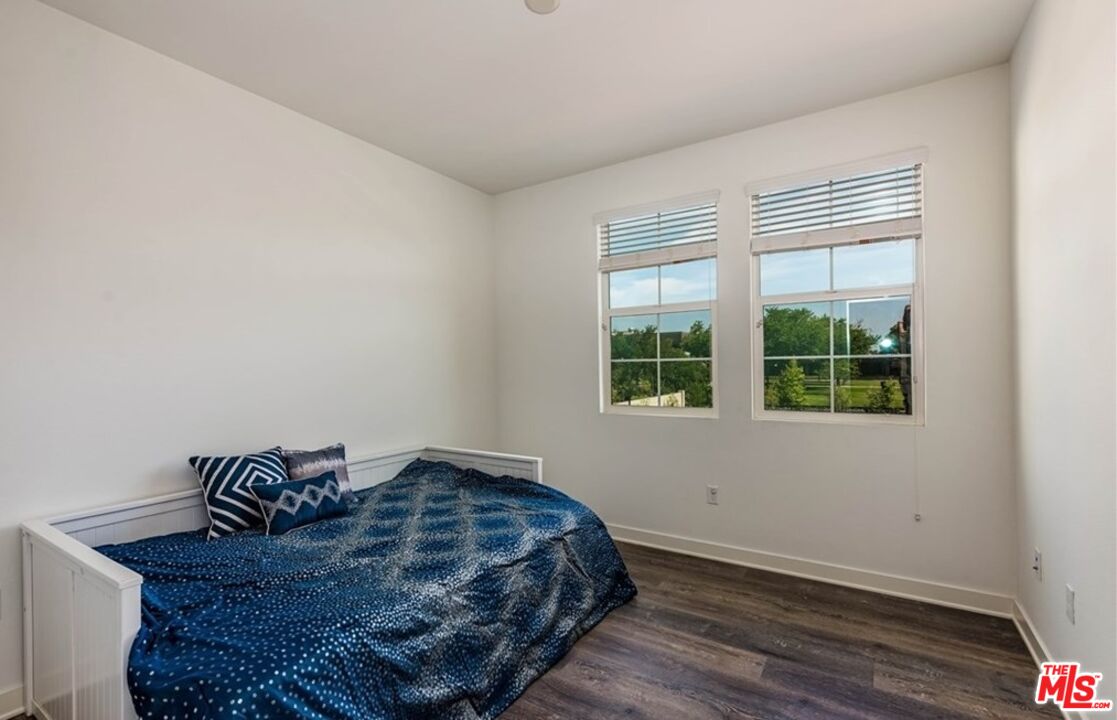 5304 Harvard Way Cypress, CA 90630 - Photo 18 of 29 a bedroom with a bed and window