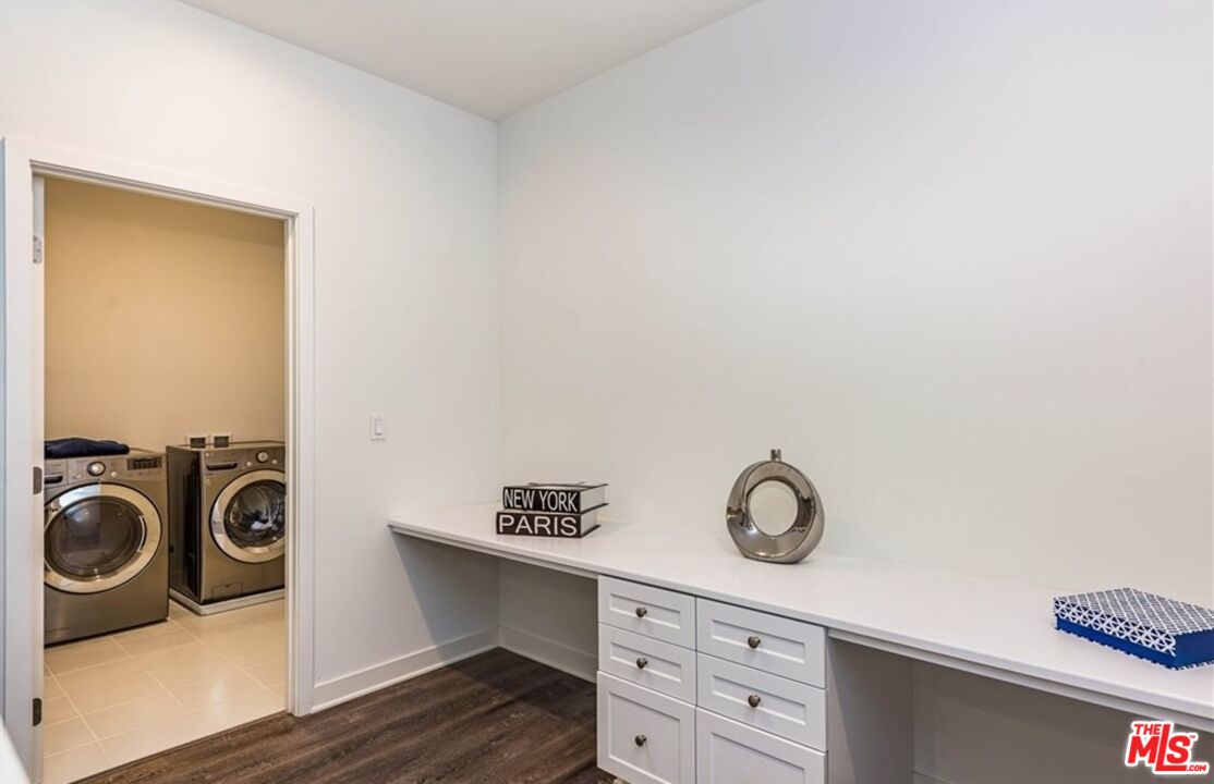 5304 Harvard Way Cypress, CA 90630 - Photo 23 of 29 a view of cabinets and wooden floor