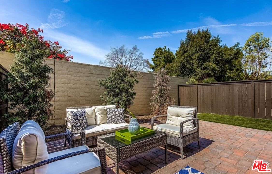 5304 Harvard Way Cypress, CA 90630 - Photo 26 of 29 a view of a chairs and table in the backyard