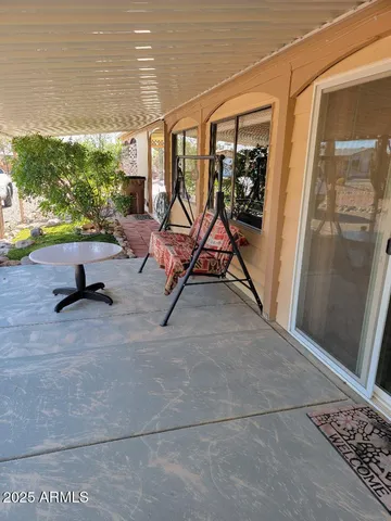 a close up of a flower pot with garden