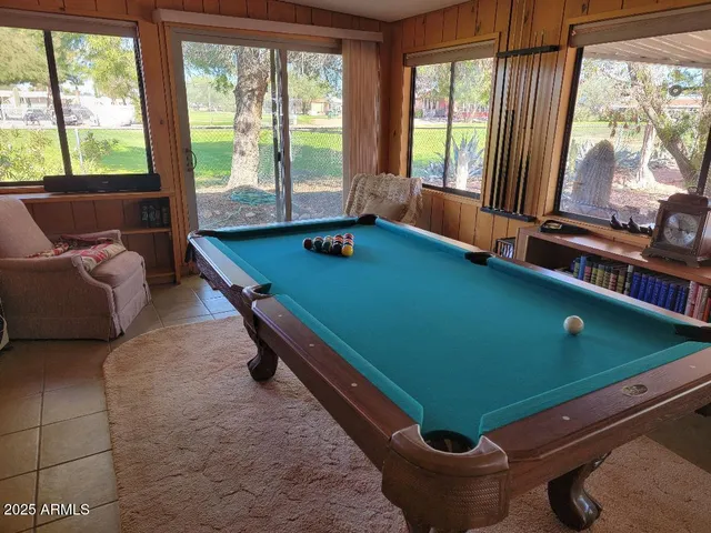 a lobby with furniture and window