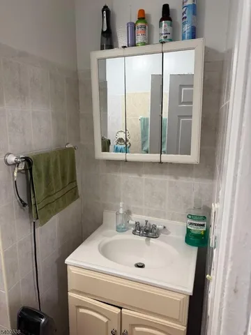 a bedroom with a bed and furniture