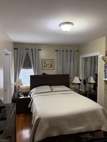 a kitchen with a table chairs stove and cabinets
