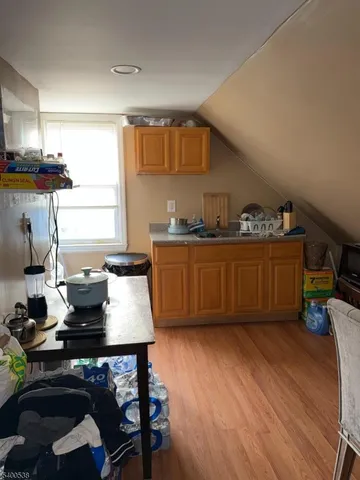 a bedroom with a bed and a table