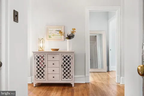 a view of kitchen with wooden floor