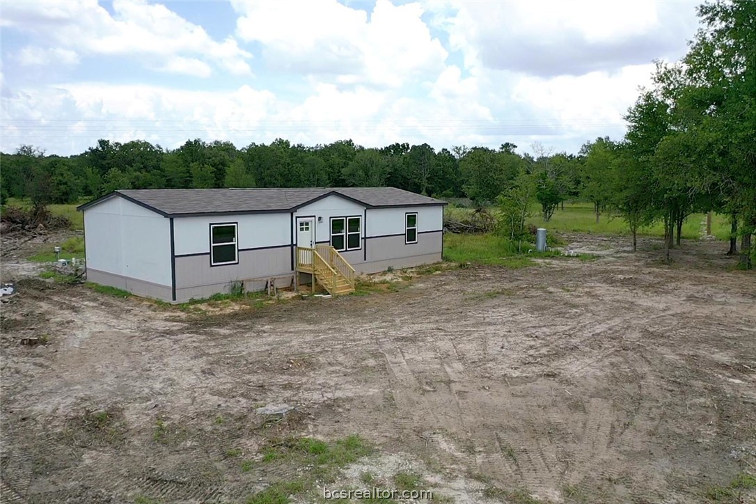 9960 Goose Prairie Road Midway, TX 75852 - Photo 6 of 36 a view of a house with backyard