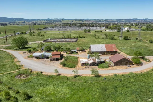 an aerial view of a garden with mountain