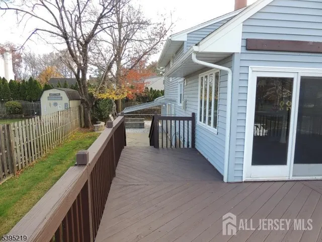 a view of a house with a roof deck