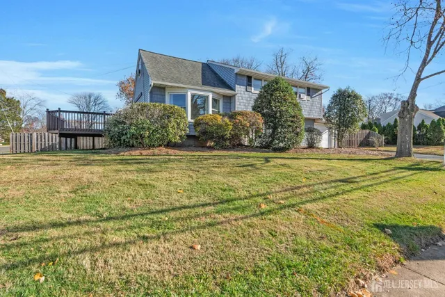 a front view of a house with garage
