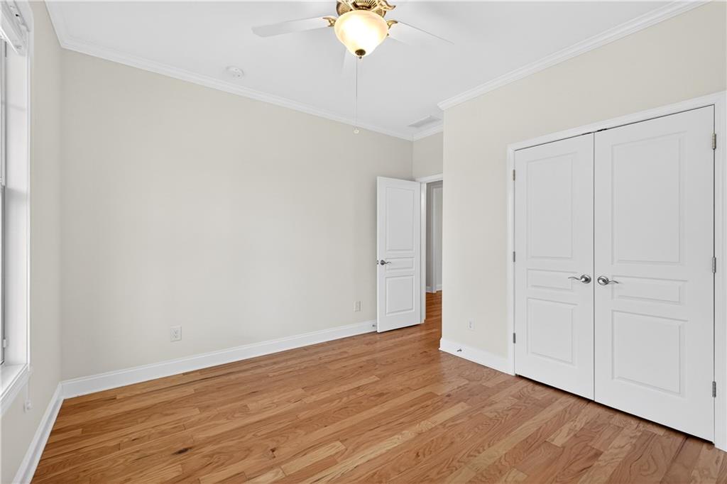 310 Pepperwood Way Canton, GA 30114 - Photo 28 of 54 a view of an empty room with wooden floor