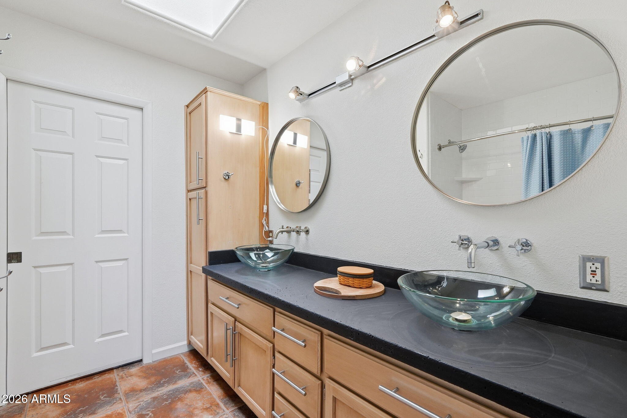 13619 North 18th Street Phoenix, AZ 85022 - Photo 47 of 53 a bathroom with a sink and a mirror