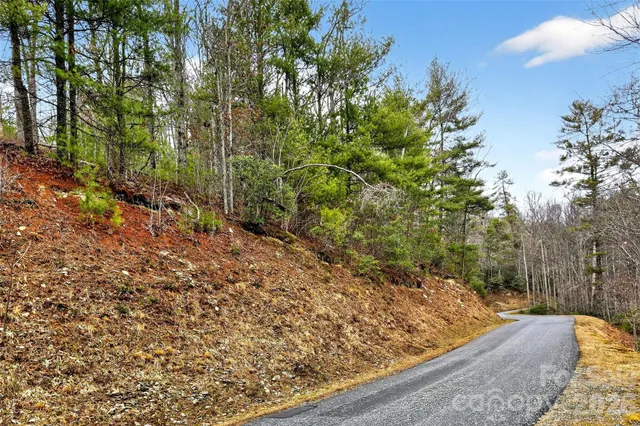 a view of a backyard of the house