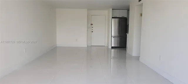 a view of a room with an empty space