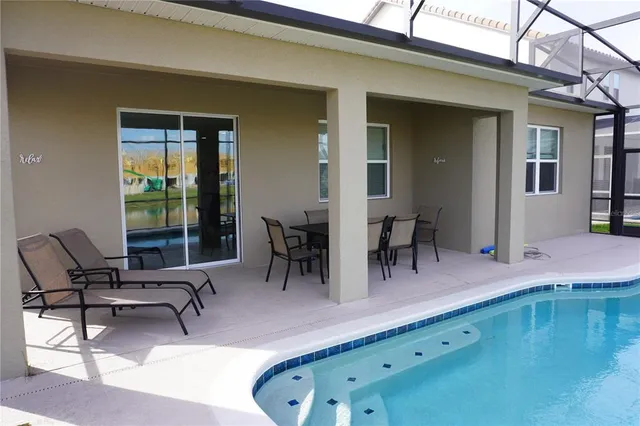 a view of a livingroom with furniture and porch